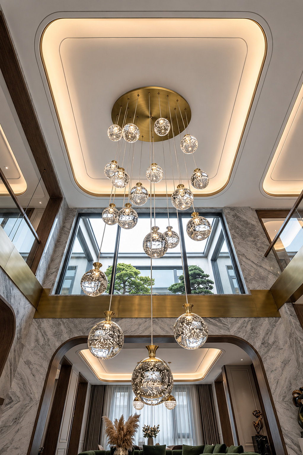 Luxurious chandelier hanging from a ceiling with a modern interior design.