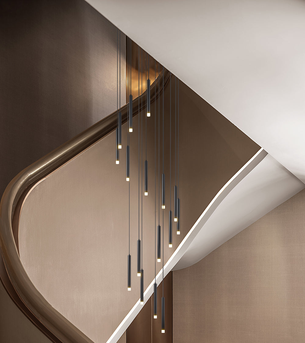 Sleek black LED pendant light adds a touch of elegance to the modern staircase.