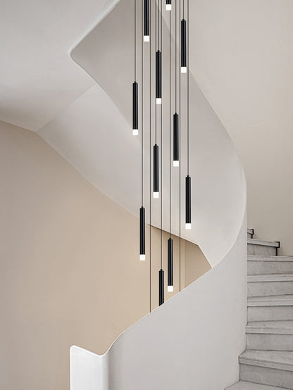 Chic Black LED  pendant light swings delicately over staircase, adding a touch of sophistication.
