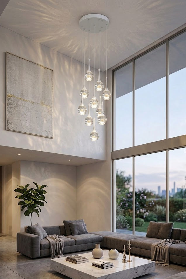 Modern living room with large windows, gray sofa, and decorative elements.