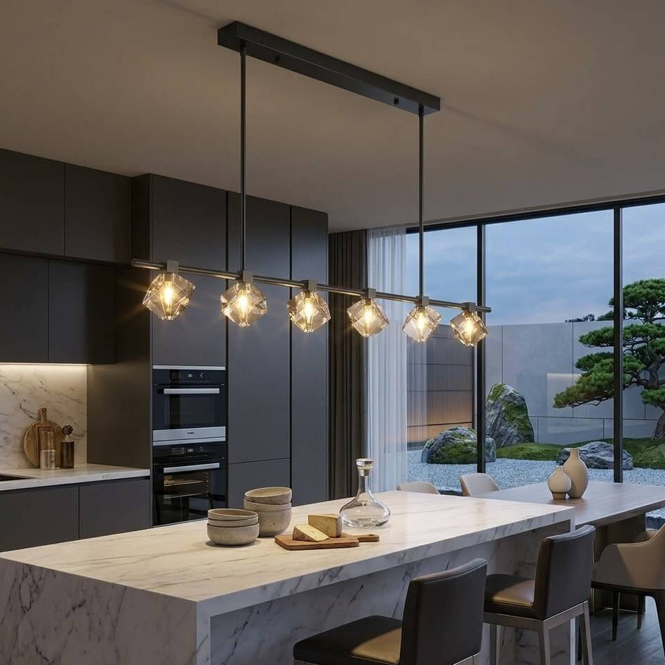 Modern kitchen with marble island and pendant lights