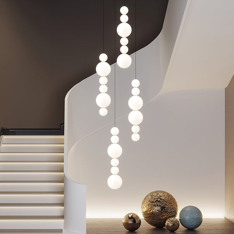 Effortless Serenity: White Bead Pendant Illumination