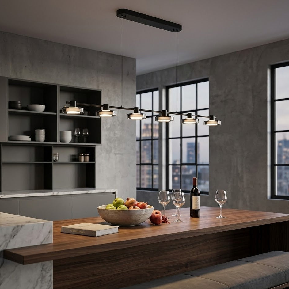 Modern kitchen with wooden counter, fruit bowl, wine bottle, and glasses.